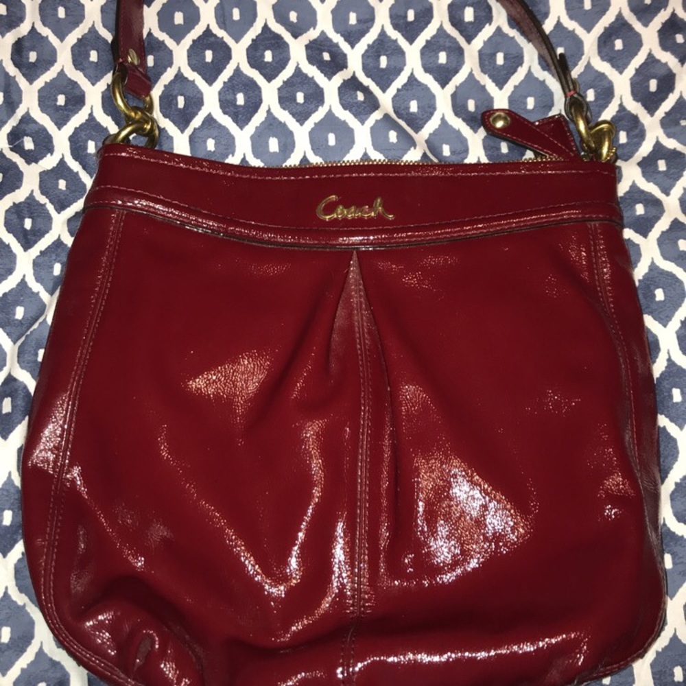 Maroon/burgundy coach purse